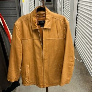 Large brown Wilson’s leather Pele Studio  jacket